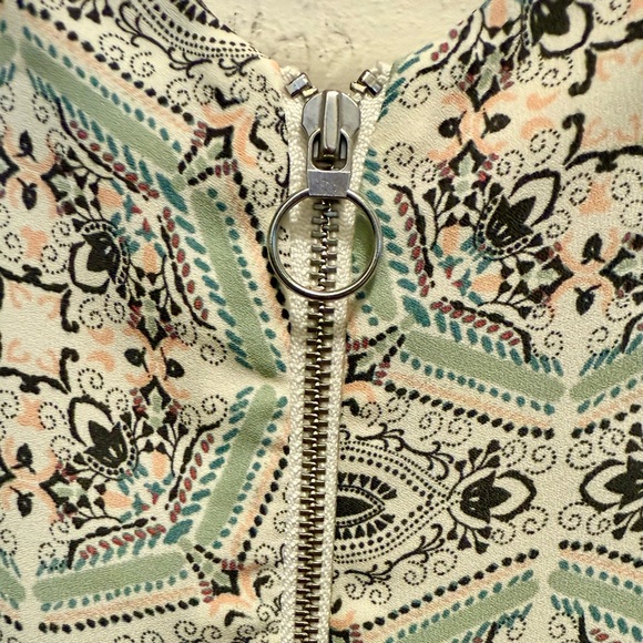 Maurices White and Green Blouse with Playful Pattern and Short Sleeves - Picture 6 of 10